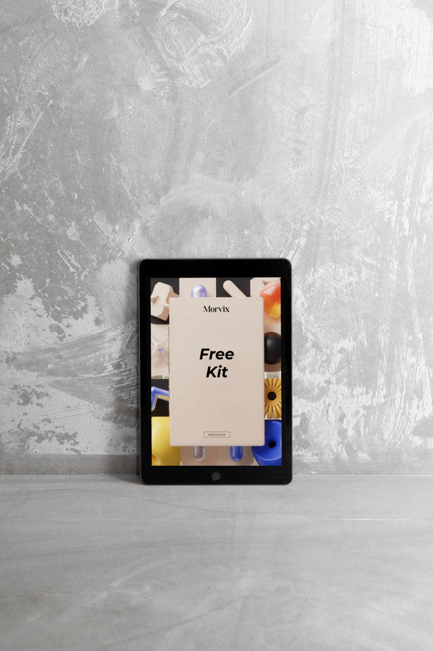 Digital tablet displaying a Mervis free kit offer on a gray textured surface